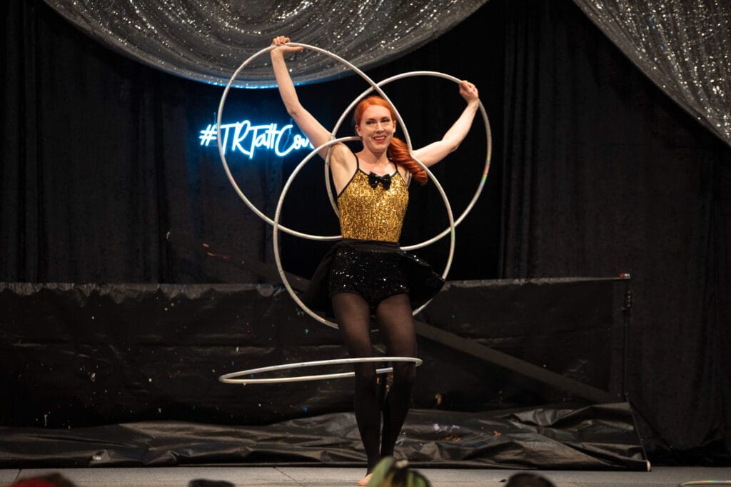 Performer with hula hoops on stage