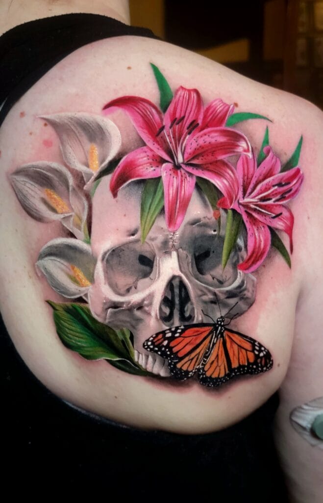 Vibrant tattoo with skull and flowers